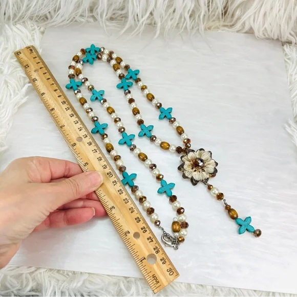 Beautiful weighted bohemian chic long statement necklace